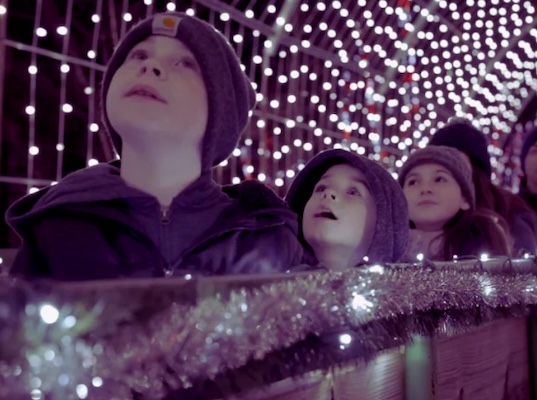 Kids looking up in amazement.