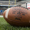 A football sitting on the field.