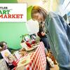 A customer shops at Art Market.